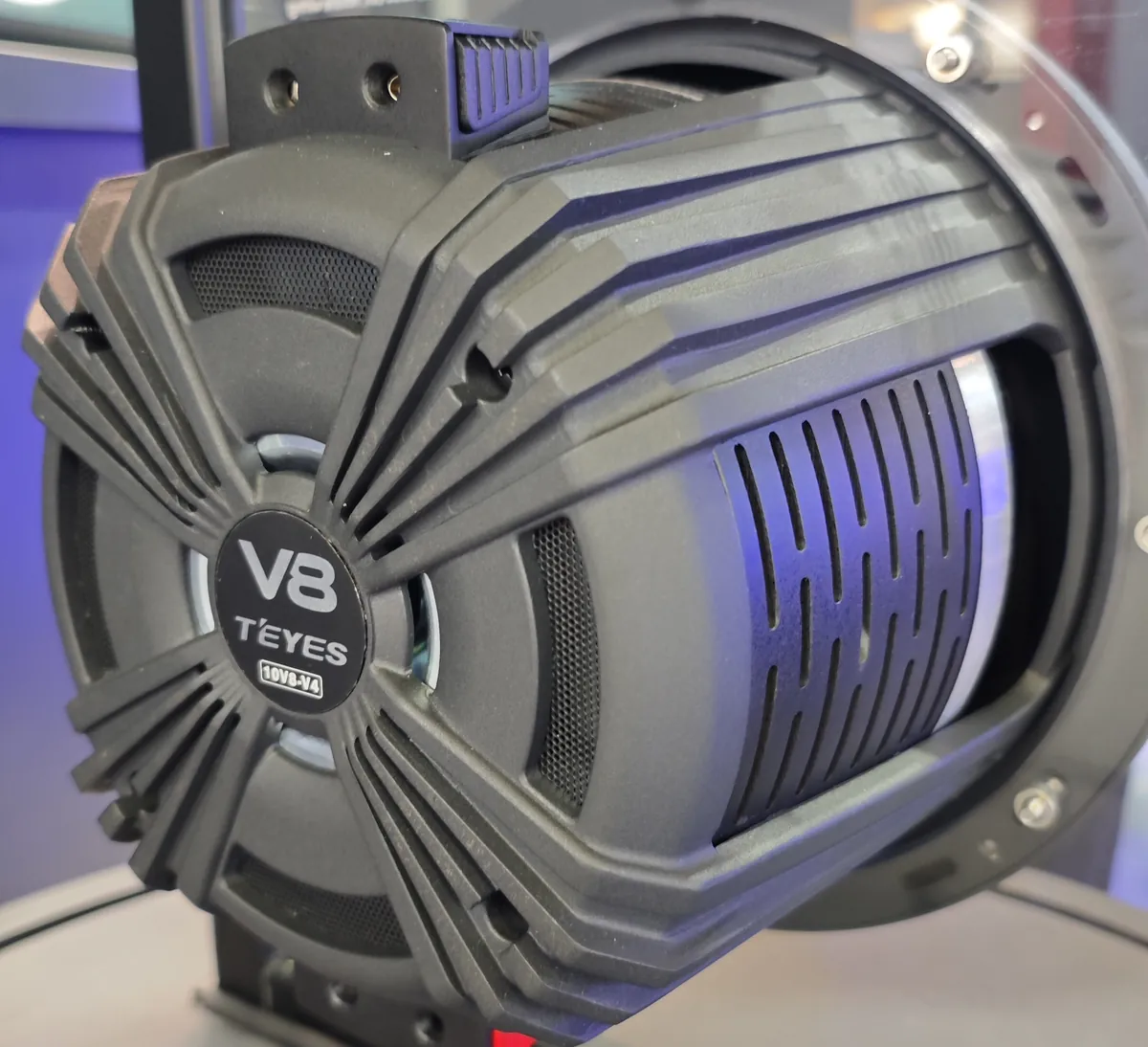 TEYES 10V8-V4 competition subwoofer driver rear view with vented motor structure at Automechanika Frankfurt 2026