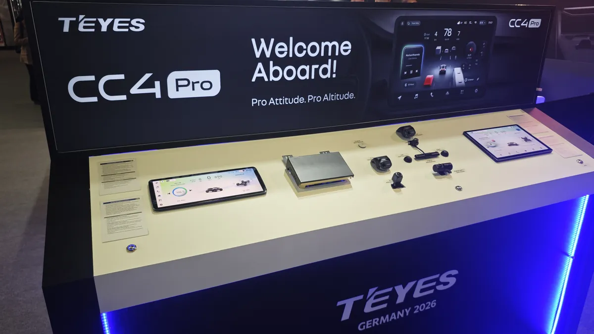 TEYES CC4 Pro display island at Automechanika Frankfurt 2026 — live head unit, AI dashboard on screen and camera accessories
